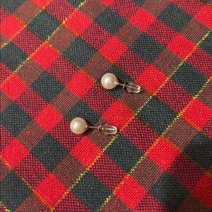 1 Set of 6 pairs of 4mm white pearl earrings. Brand new, never worn.”